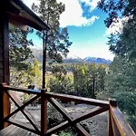 Cabaña en el bosque con vista