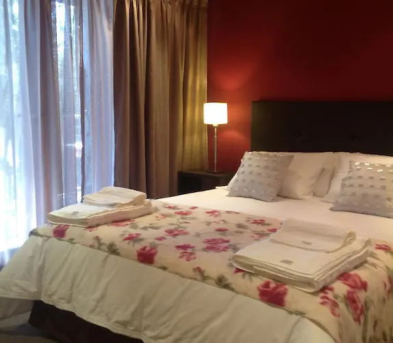 Maria Del Bosque Apart Hotel / Cabanas