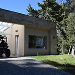 Cabaña con costa de lago